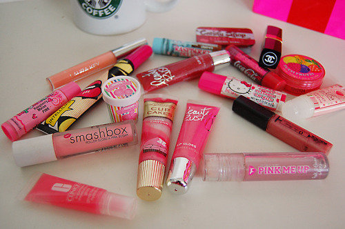How many lipglosses does the average woman have?